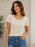 Blusa slim fit cuello redondo