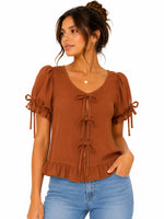 Blusa corta con lazos