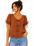 Blusa corta con lazos