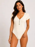 Body básico de algodón cuello V