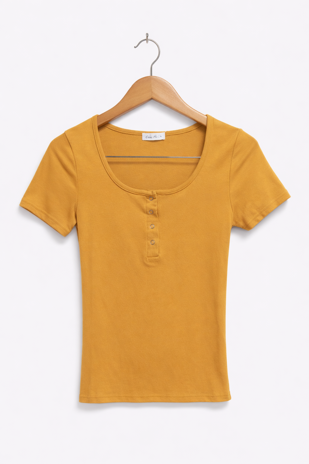 Blusa básica con broches