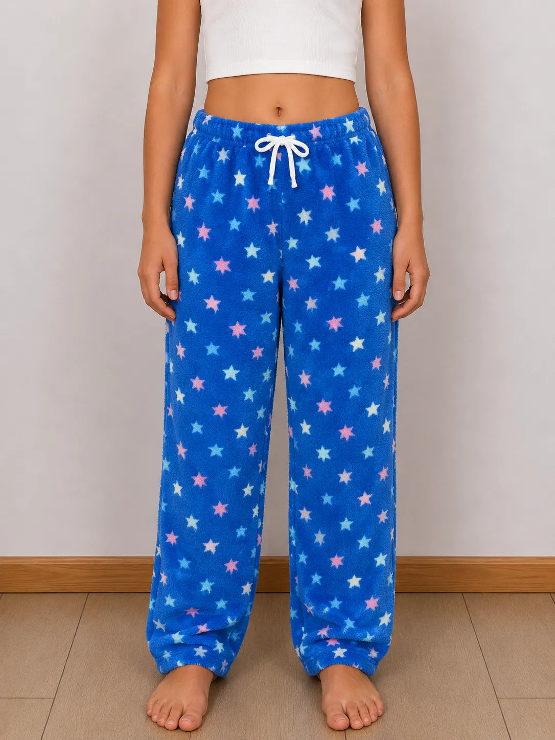Pantalón pijama de peluche diseño estrellas