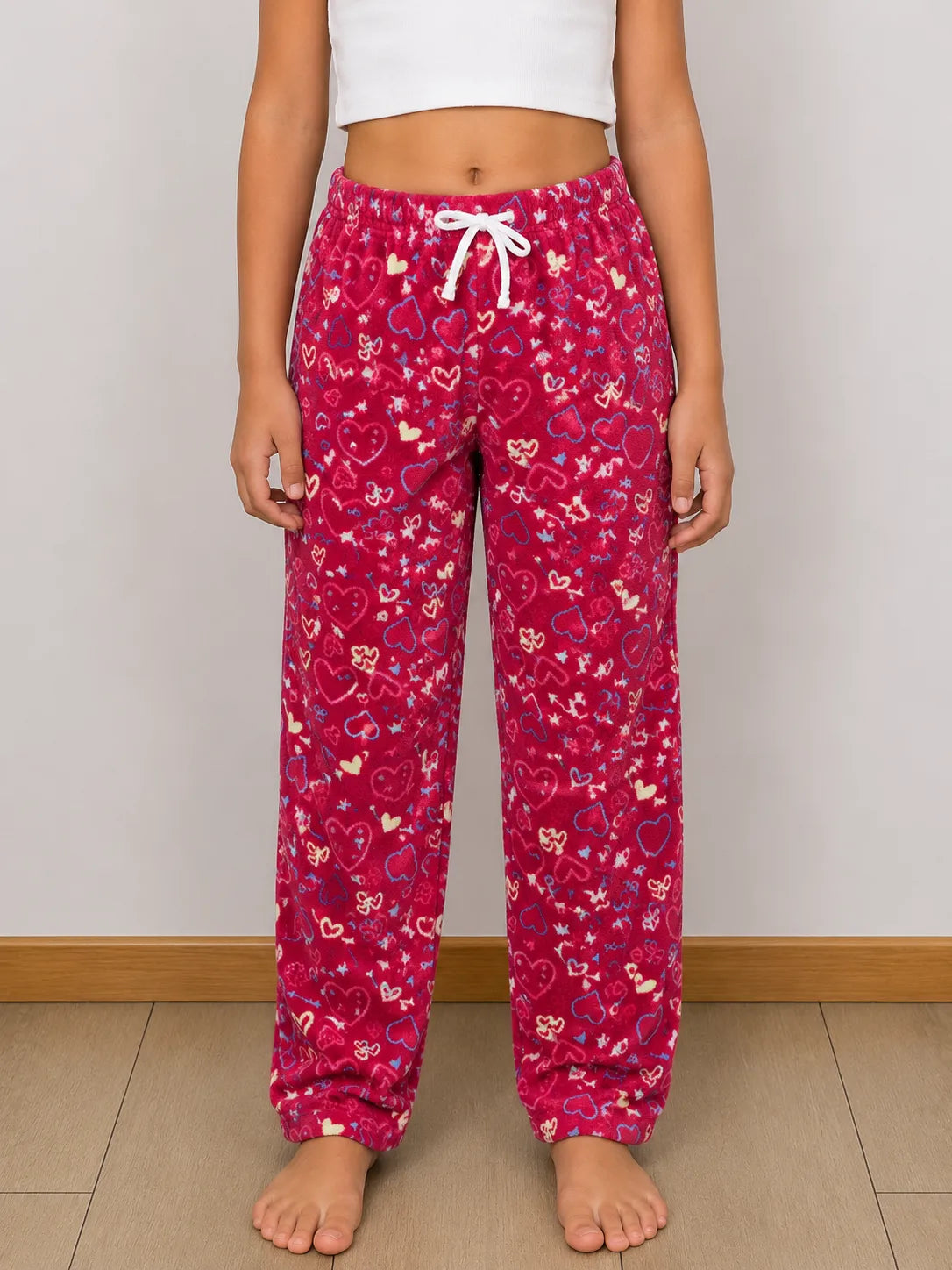 Pantalón de peluche diseño corazón, para niña