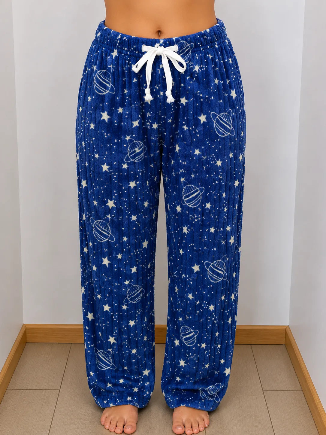 Pantalón peluche galaxia